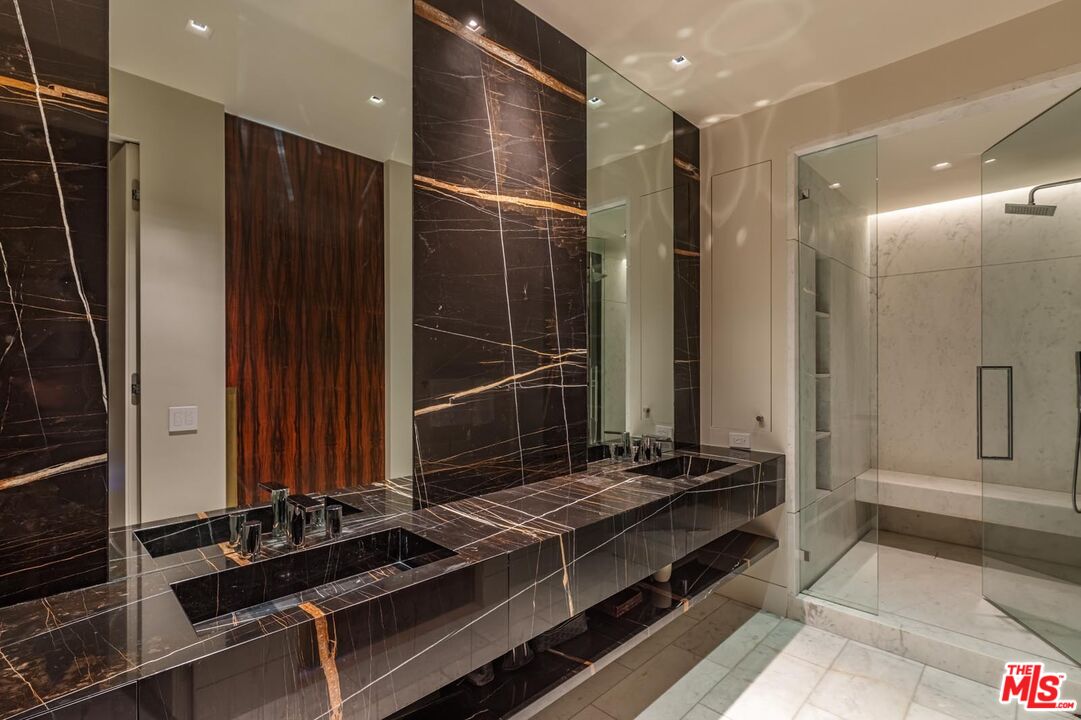 9255 Doheny Road, Unit 1901 West Hollywood, CA 90069 - Photo 16 of 23 a room with gym equipment