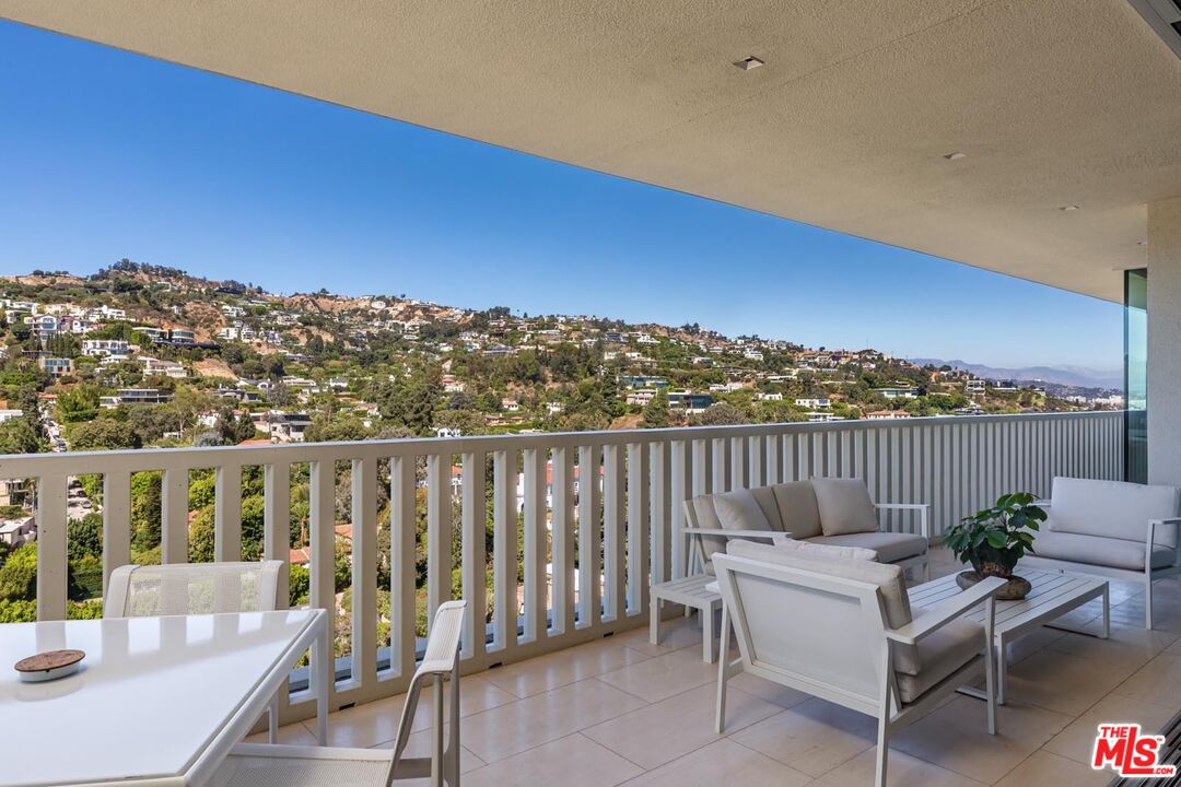 9255 Doheny Road, Unit 1901 West Hollywood, CA 90069 - Photo 6 of 23 a view of balcony with furniture