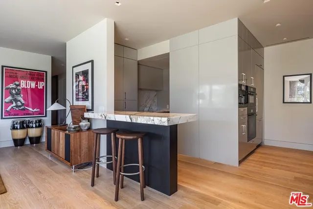 a view of a livingroom with furniture and window