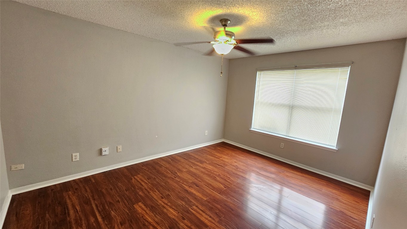 7704 Sign Street Houston, TX 77489 - Photo 14 of 27 an empty room with a window