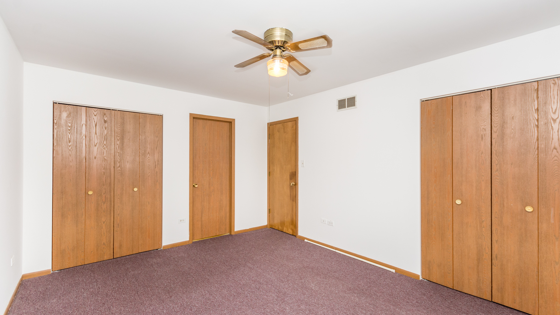 10205 South Springfield Avenue Chicago, IL 60655 - Photo 14 of 34 a view of an empty room with a ceiling fan