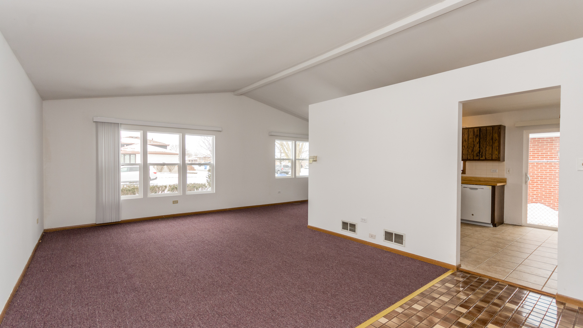 10205 South Springfield Avenue Chicago, IL 60655 - Photo 3 of 34 an empty room with windows