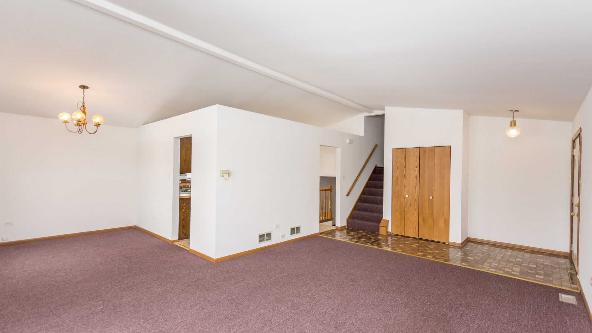 10205 South Springfield Avenue Chicago, IL 60655 - Photo 5 of 34 an empty room with a ceiling fan and entryway