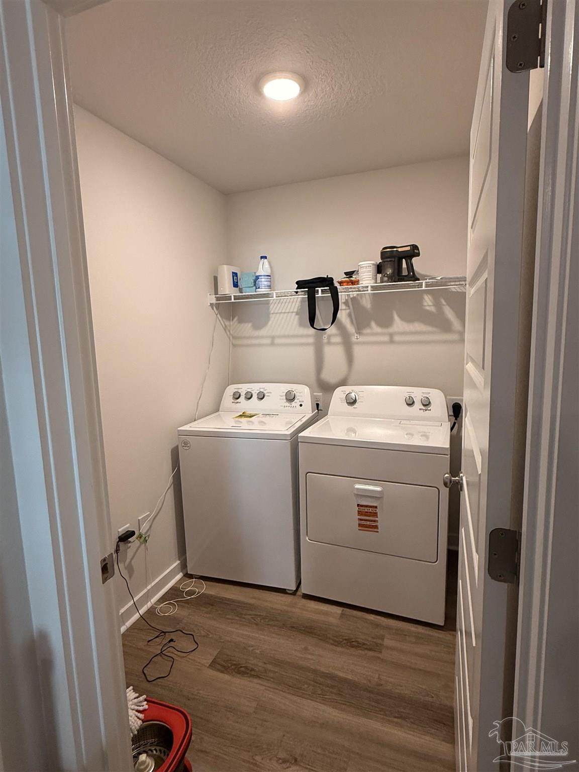 8 Spoonbill Street Cantonment, FL 32533 - Photo 11 of 22 a utility room with dryer and washer