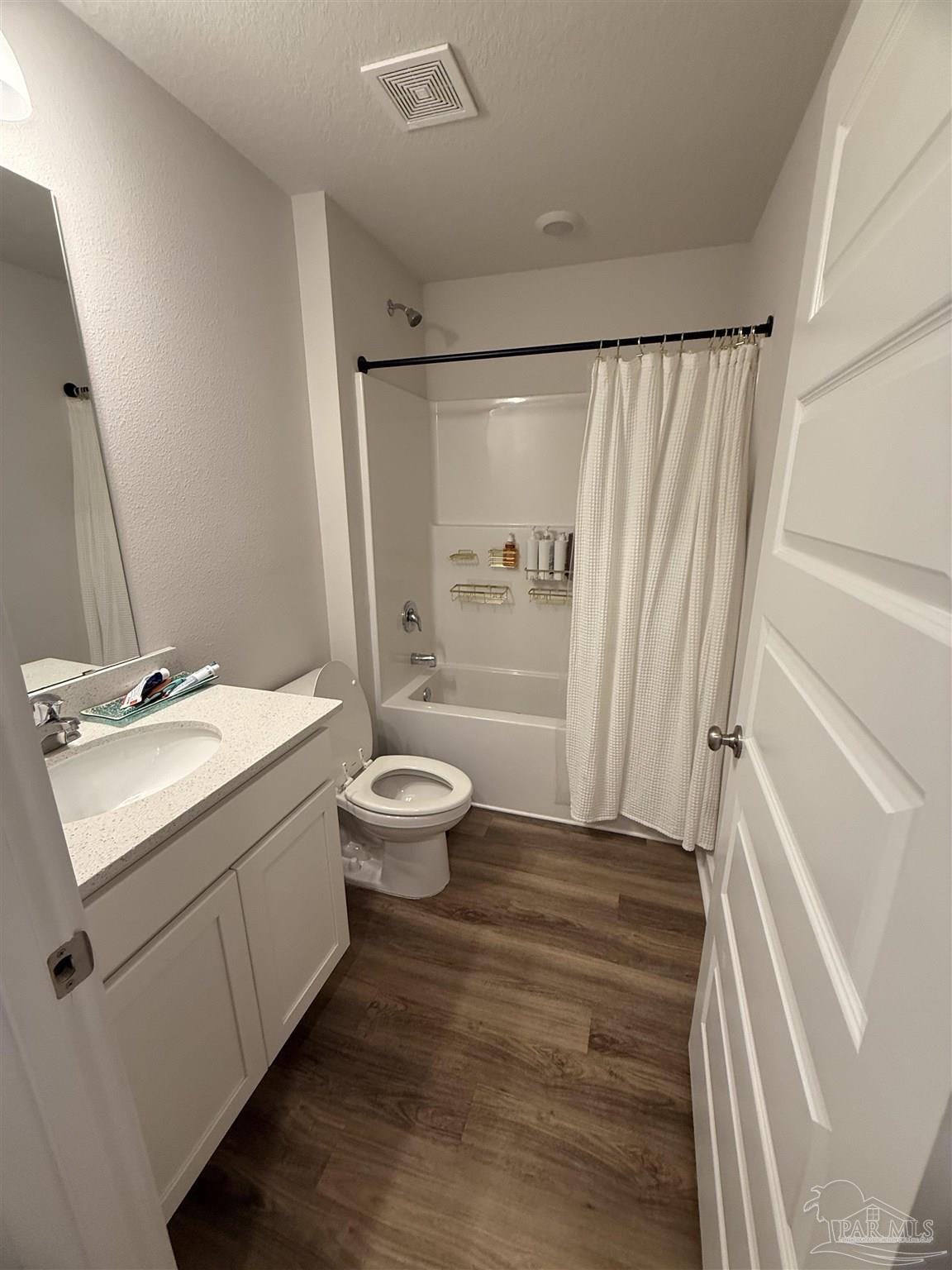 8 Spoonbill Street Cantonment, FL 32533 - Photo 14 of 22 a bathroom with a sink toilet and shower