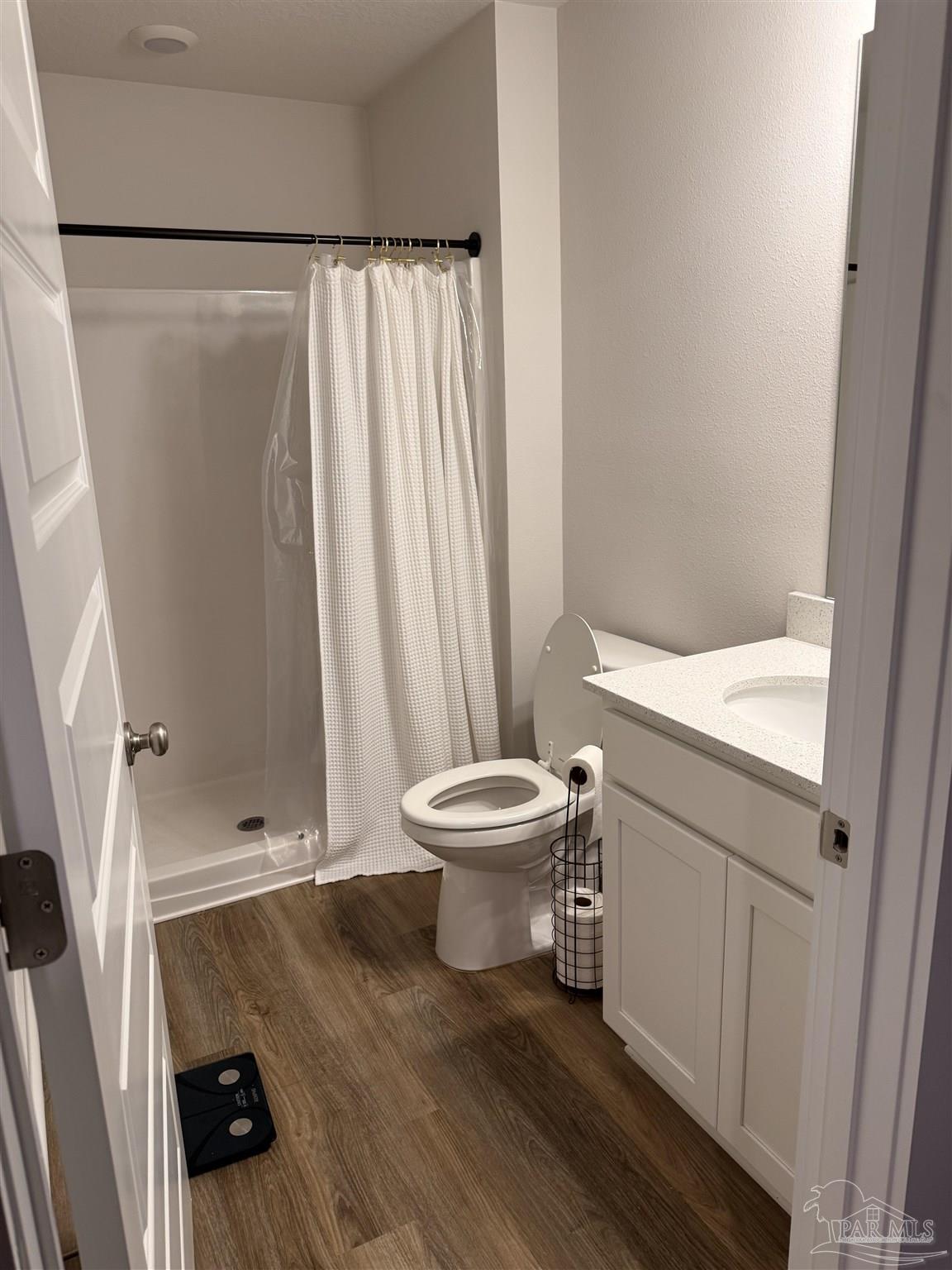 8 Spoonbill Street Cantonment, FL 32533 - Photo 18 of 22 a bathroom with a sink and a toilet