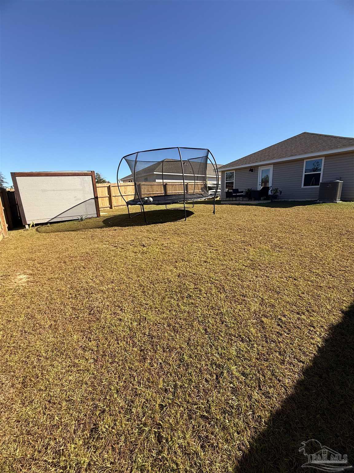 8 Spoonbill Street Cantonment, FL 32533 - Photo 5 of 22 a view of a garage