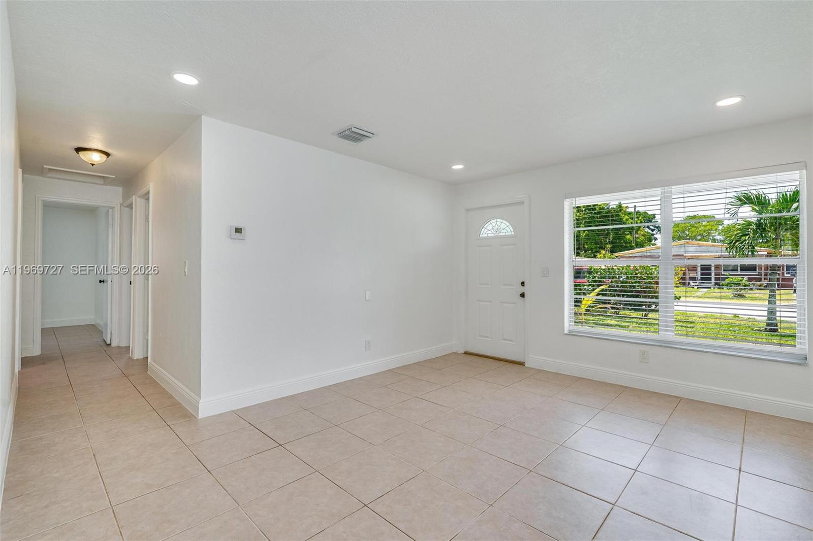 5615 Simms Street Hollywood, FL 33021 - Photo 23 of 27 a view of an empty room with a window