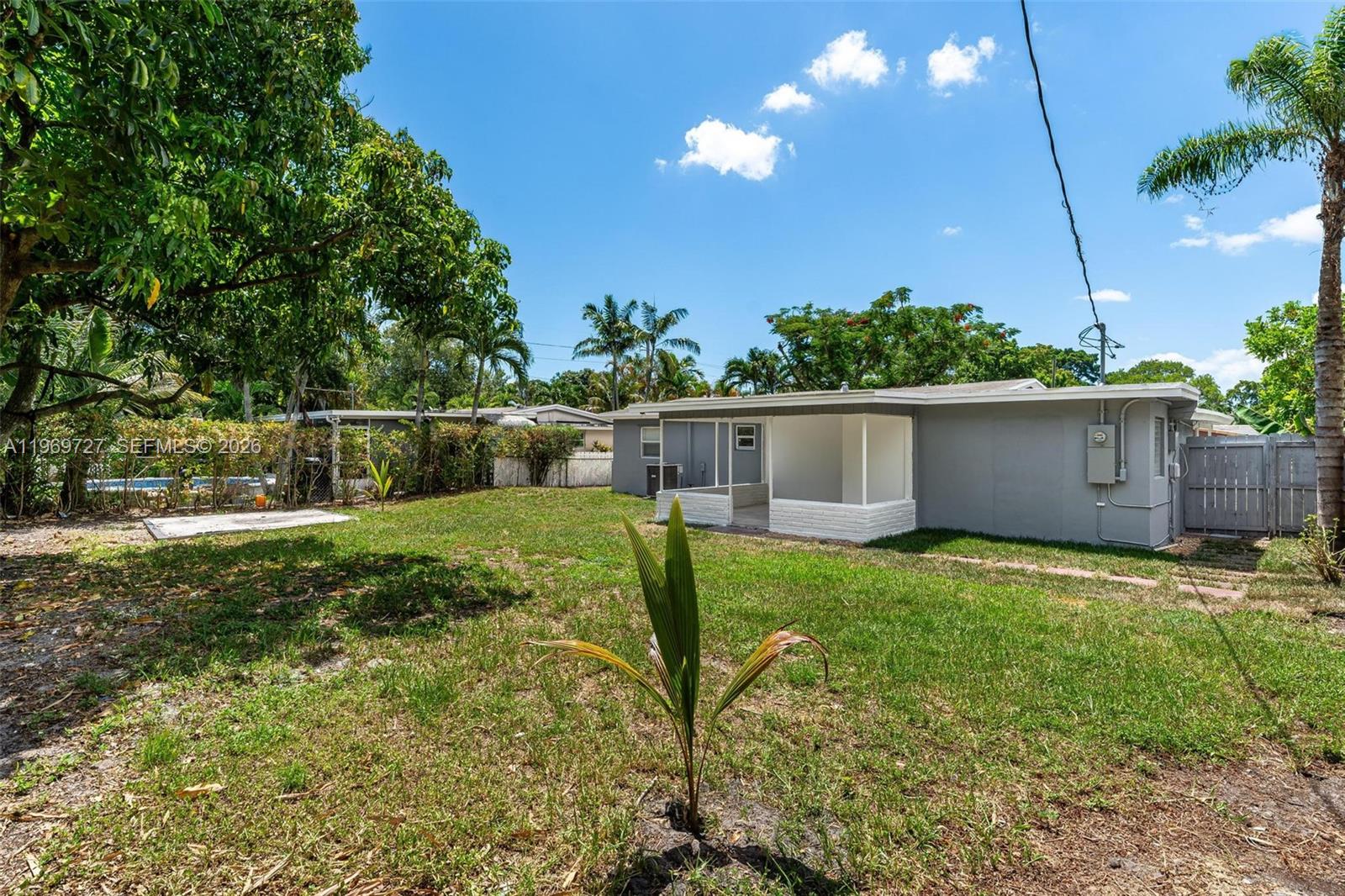 5615 Simms Street Hollywood, FL 33021 - Photo 5 of 27 a view of backyard with seating space