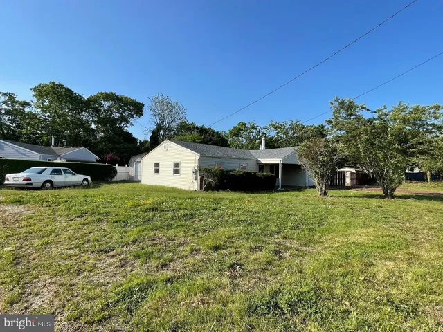 a kitchen with a stove and a microwave