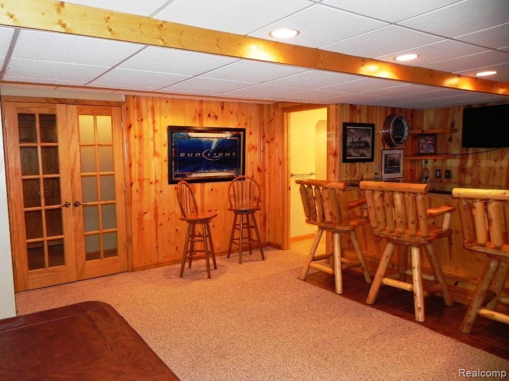 3121 Smugglers Ridge Walled Lake, MI 48390 - Photo 29 of 44 Basement wet bar view 2.JPG