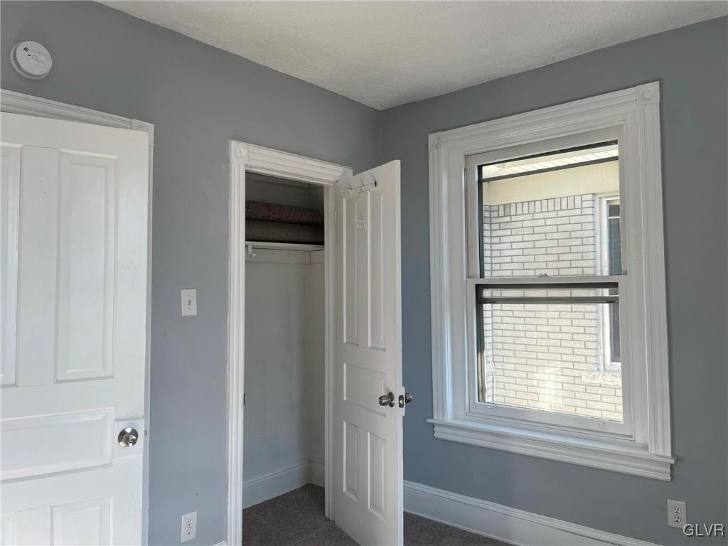 919 Spring Street Bethlehem, PA 18018 - Photo 15 of 41 a view of an empty room with closet and a window