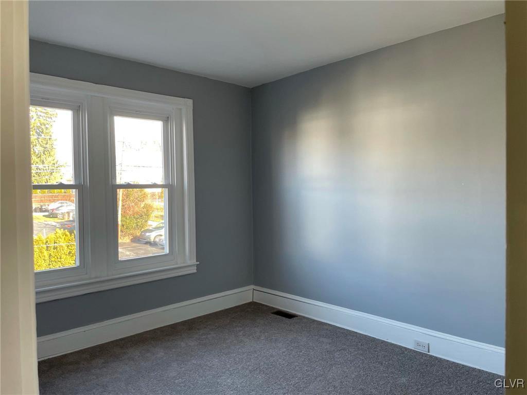 919 Spring Street Bethlehem, PA 18018 - Photo 20 of 41 an empty room with a window