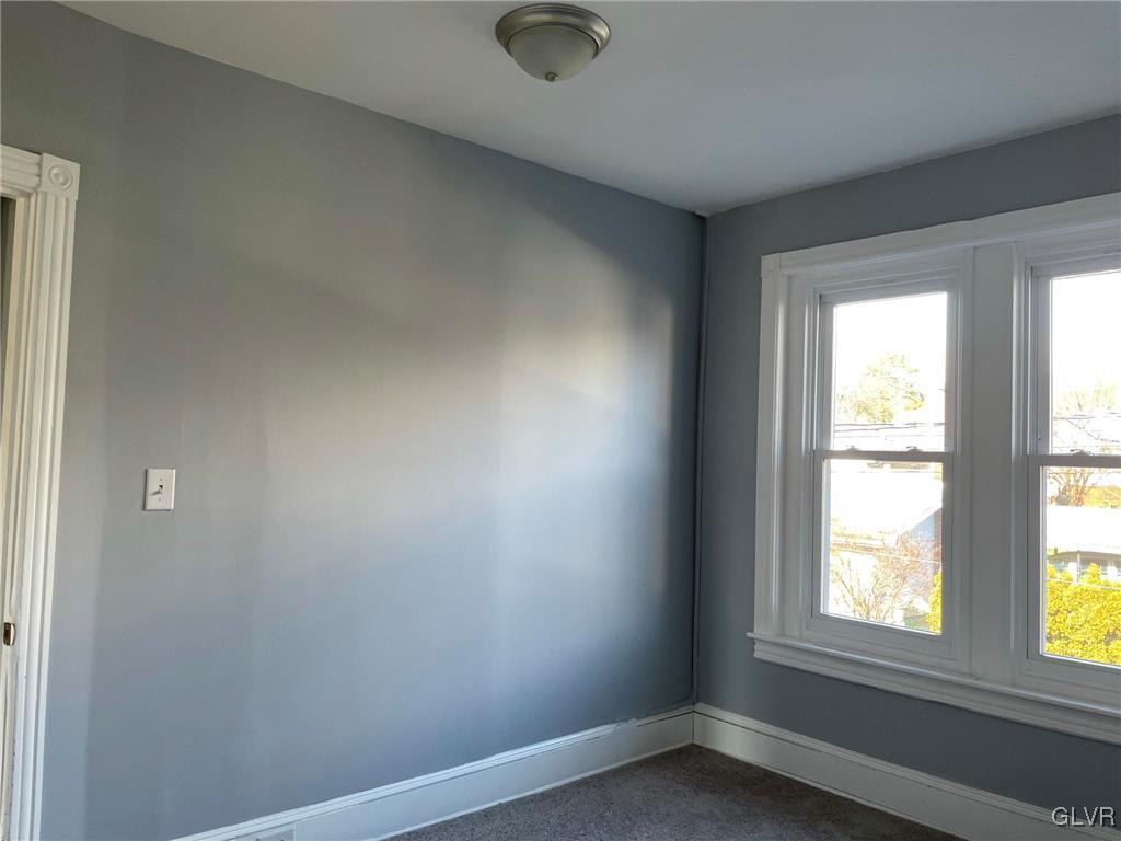 919 Spring Street Bethlehem, PA 18018 - Photo 21 of 41 an empty room with windows