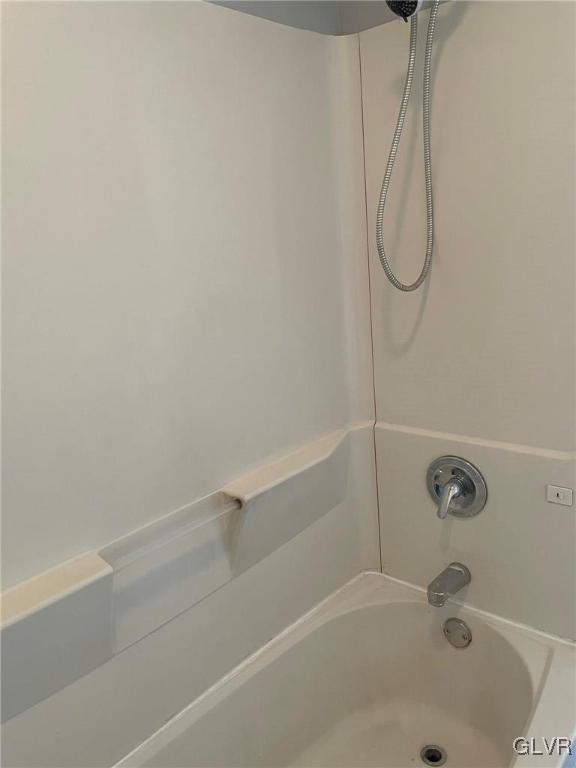 919 Spring Street Bethlehem, PA 18018 - Photo 24 of 41 a bathroom with a bath tub with a shower