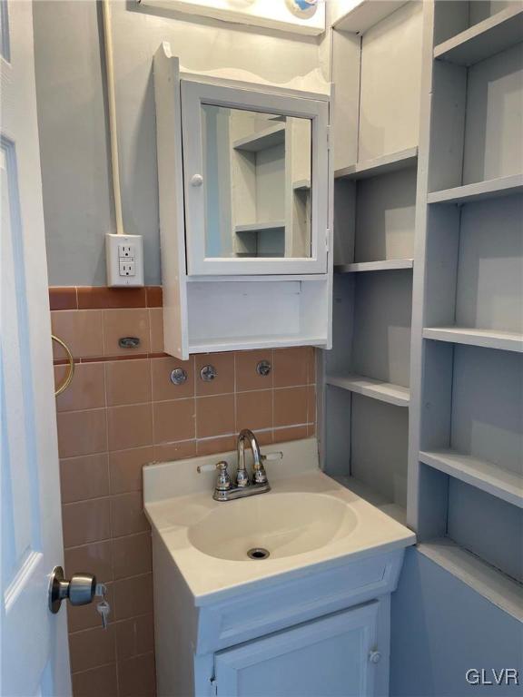 919 Spring Street Bethlehem, PA 18018 - Photo 28 of 41 a bathroom with a sink and a mirror