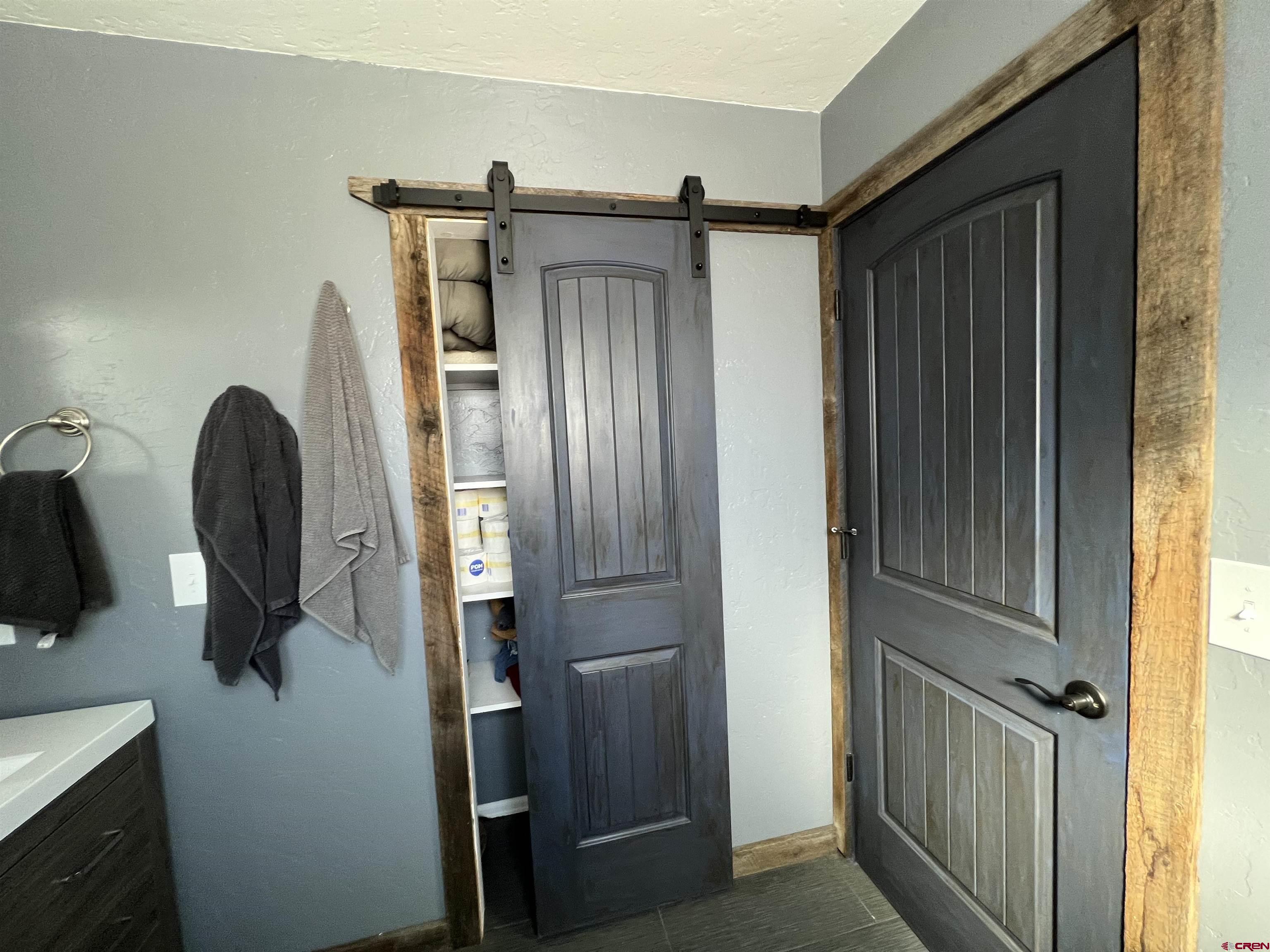 22350 Surface Creek Road Cedaredge, CO 81413 - Photo 26 of 32 a view of walk in closet