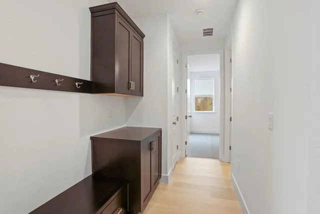 a view of a hallway with entryway