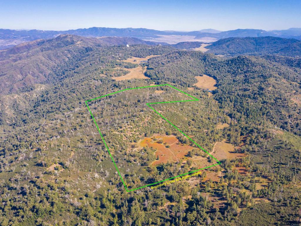 0 Palomar Divide Palomar Mountain, CA 92060 - Photo 3 of 39 a view of a dry field with mountains in the background