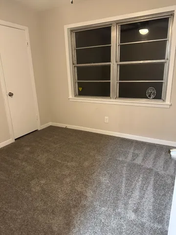 a view of an empty room with empty racks