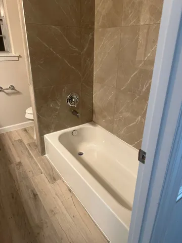 a bathroom with a bathtub