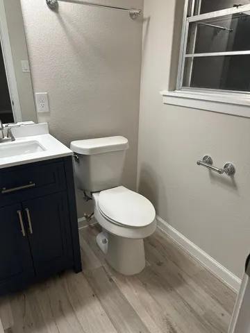 a bathroom with a sink and a toilet