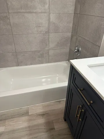 a bathroom with a bathtub