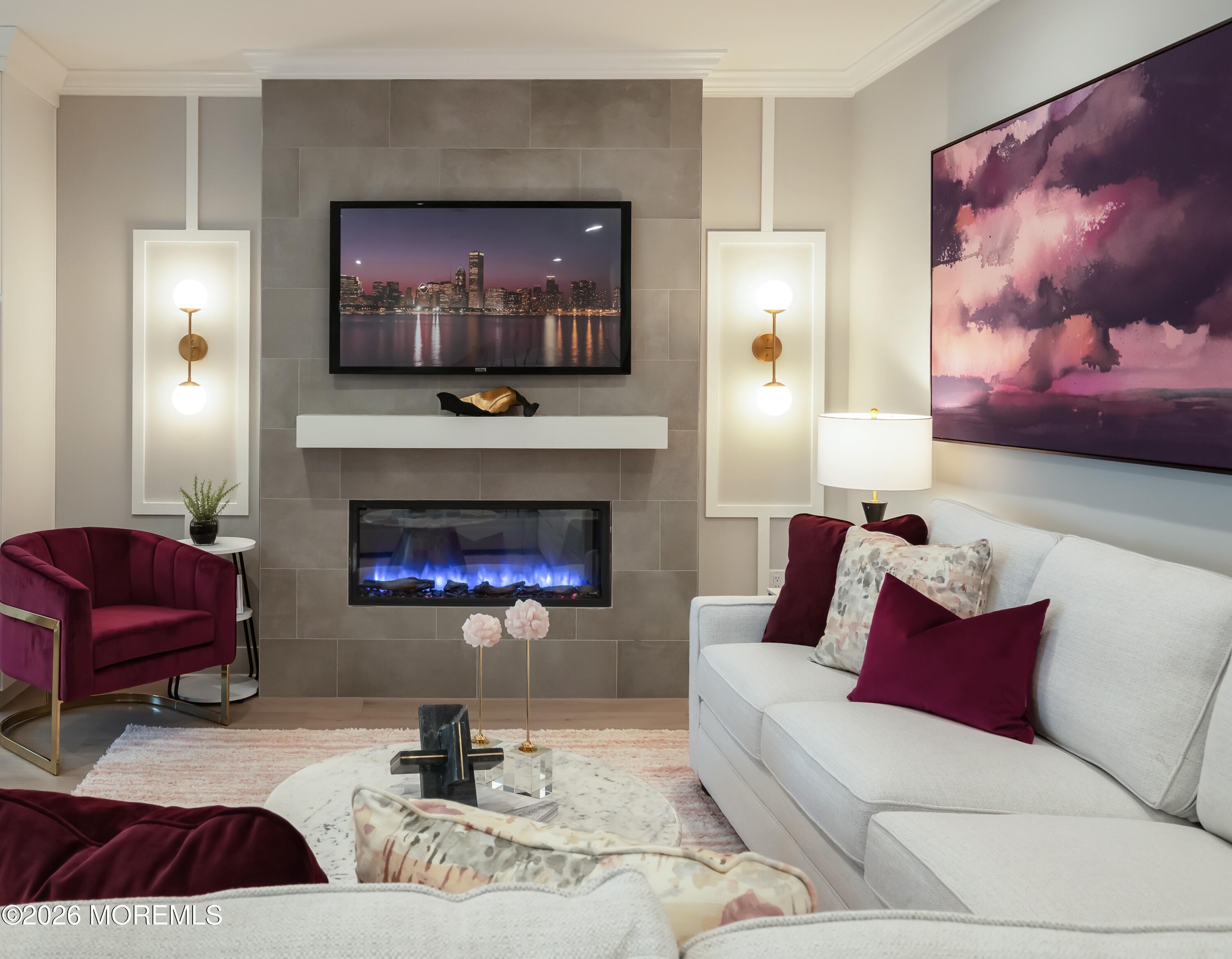 5 American Way Manalapan, NJ 07726 - Photo 3 of 8 a living room with furniture and a fireplace