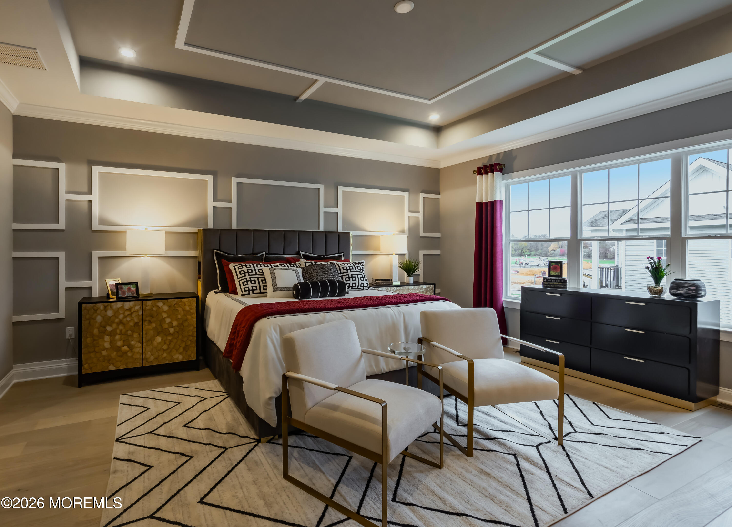 5 American Way Manalapan, NJ 07726 - Photo 4 of 8 a bed room with a bed and a couch