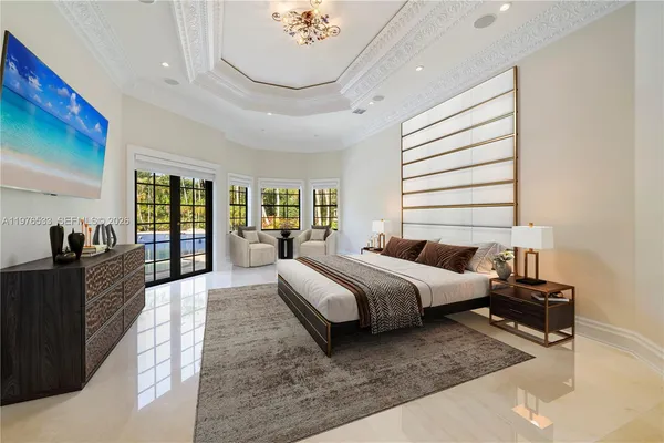 a view of an empty room with a fan