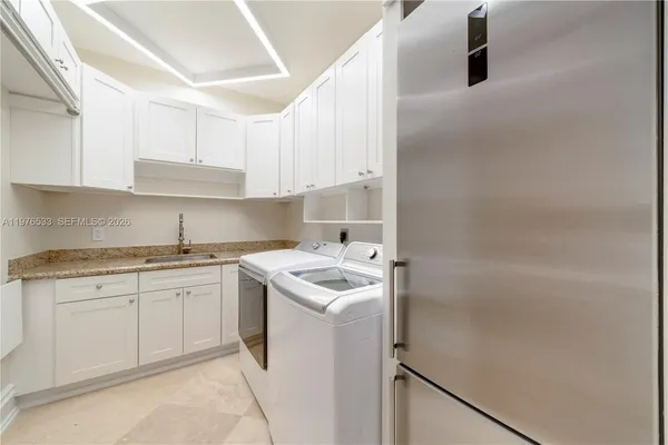 a bedroom with bed and a window