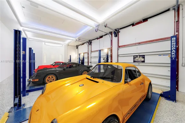 a view of a white house with a outdoor space