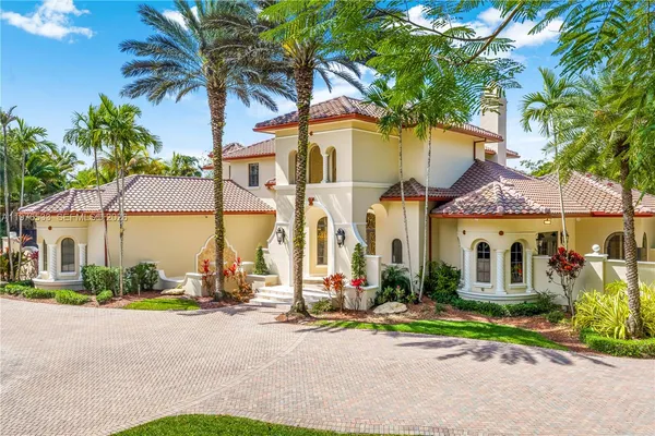 front view of a house with a small yard