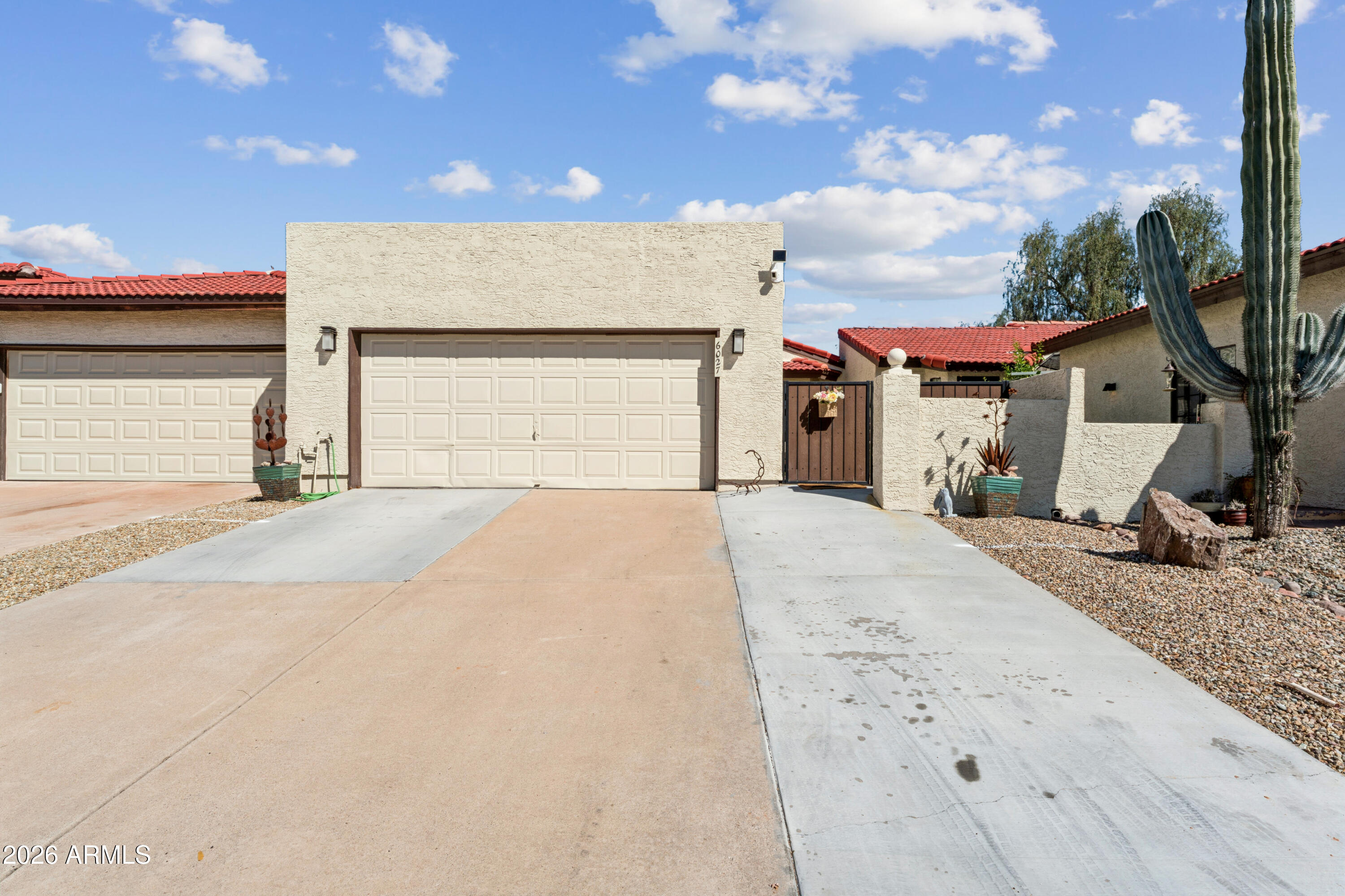 6027 South Alameda Road Gold Canyon, AZ 85118 - Photo 1 of 27 a view of a house with a backyard