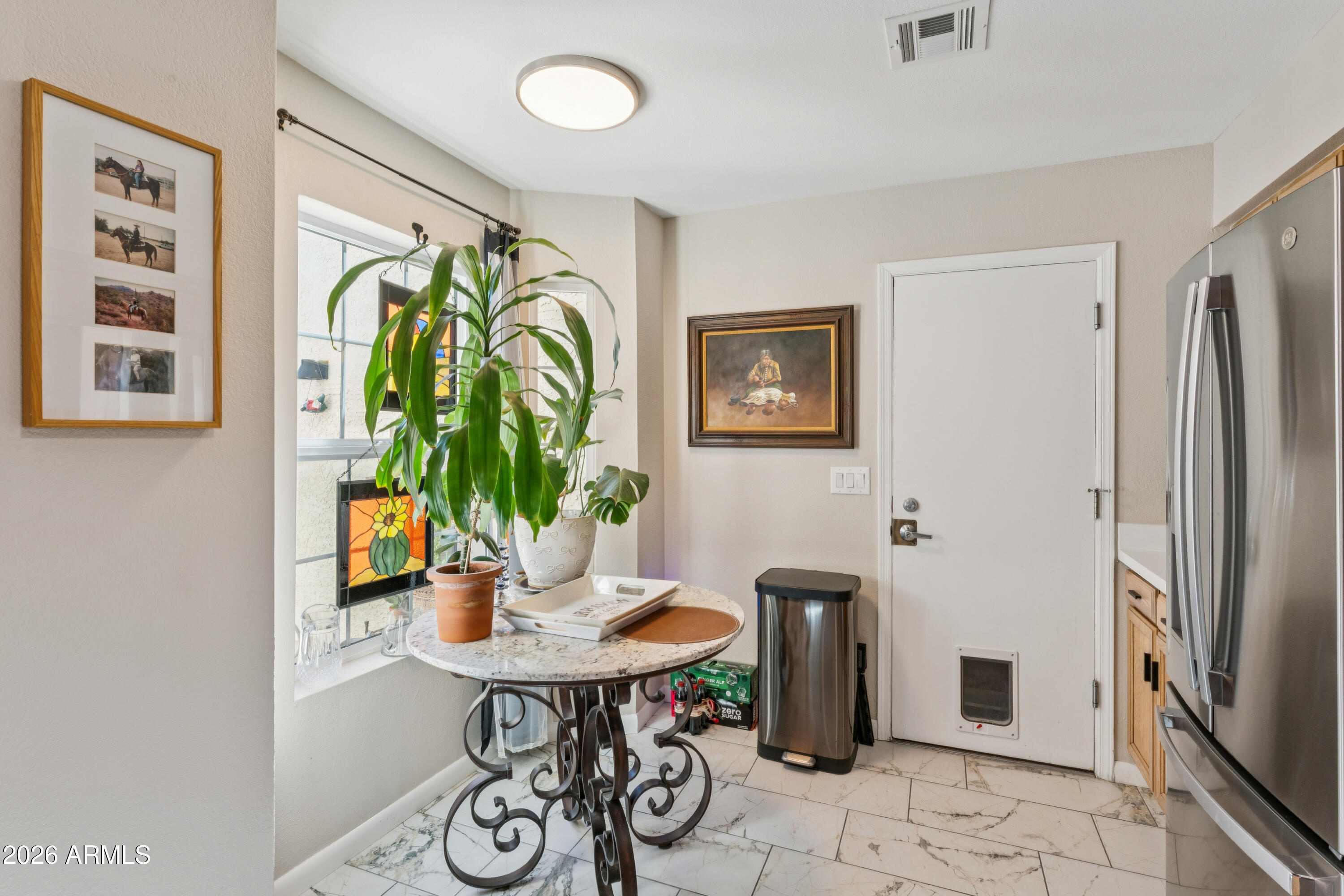 6027 South Alameda Road Gold Canyon, AZ 85118 - Photo 13 of 27 a view of a dining room with furniture