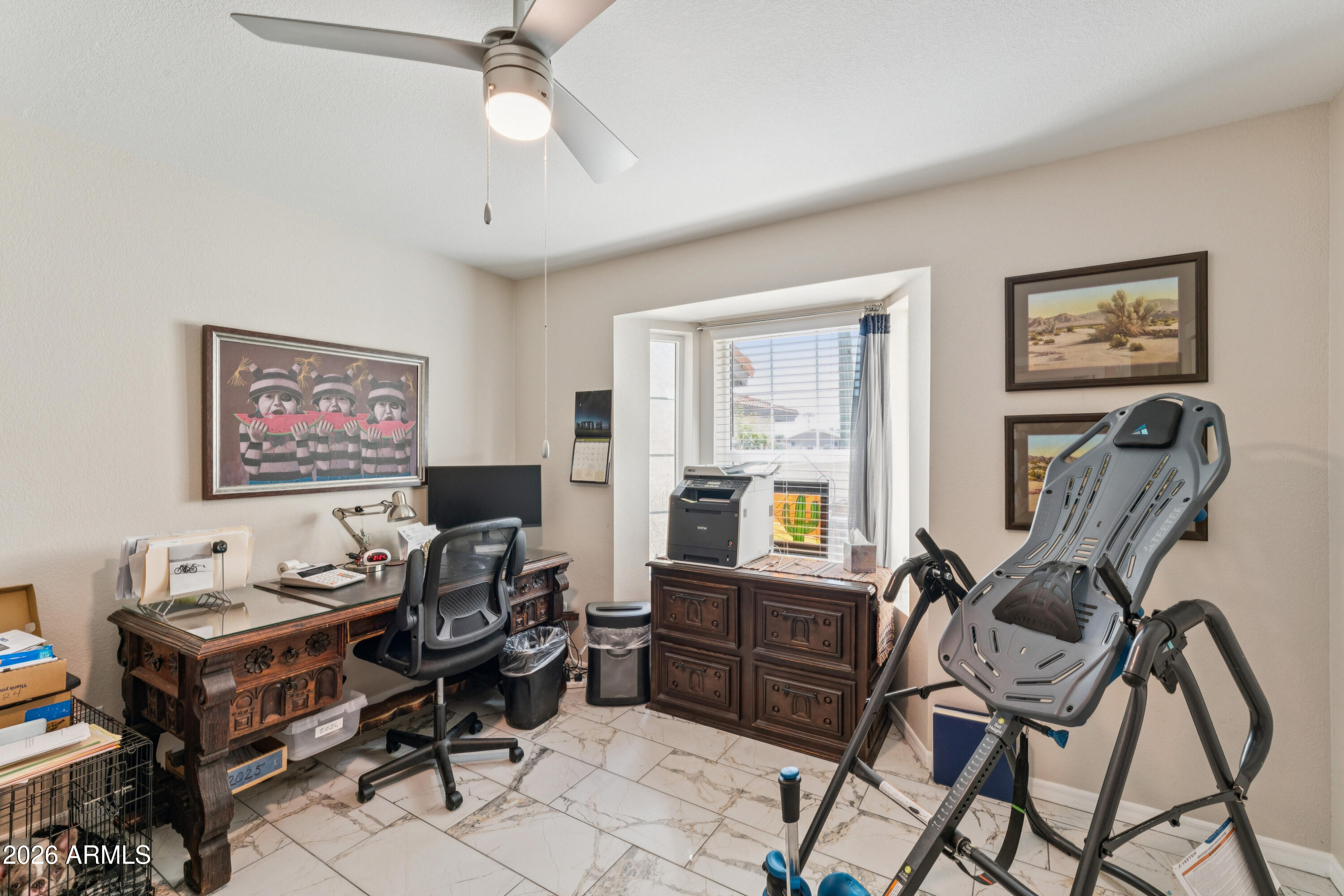 6027 South Alameda Road Gold Canyon, AZ 85118 - Photo 21 of 27 a view of a workspace with furniture and a window