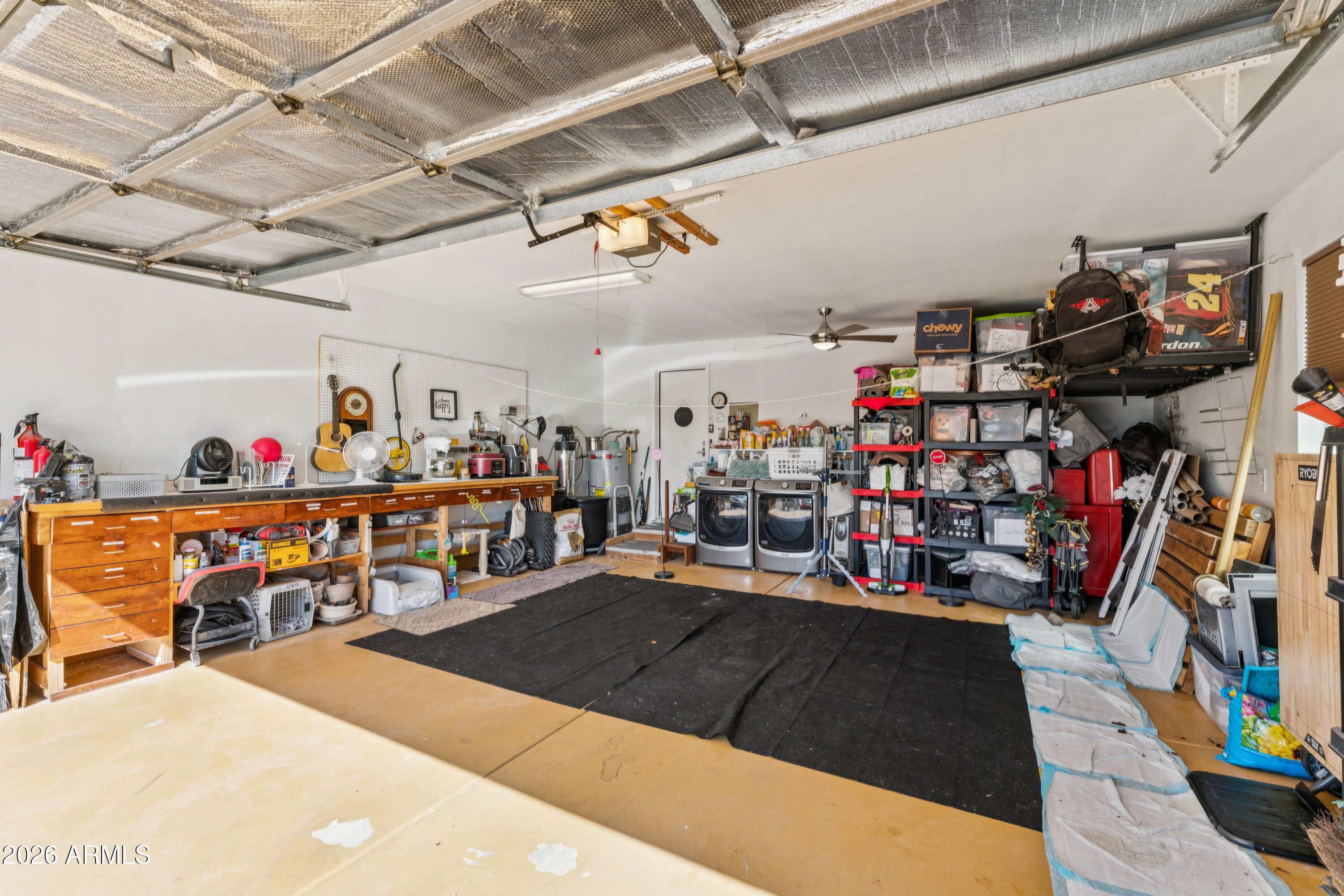 6027 South Alameda Road Gold Canyon, AZ 85118 - Photo 26 of 27 a view of a storage room with a lot of stuff