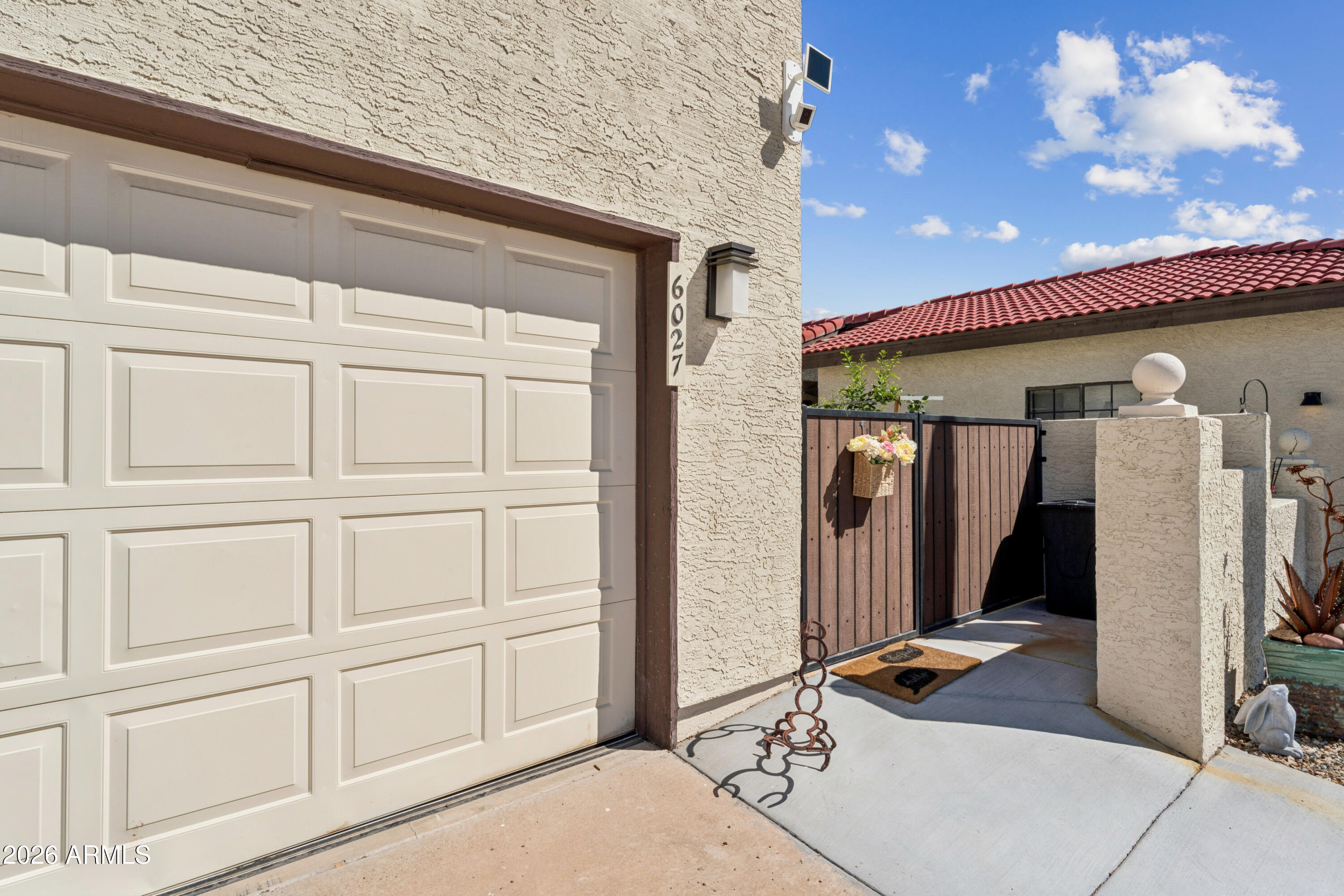 6027 South Alameda Road Gold Canyon, AZ 85118 - Photo 3 of 27 a front view of a house with entryway