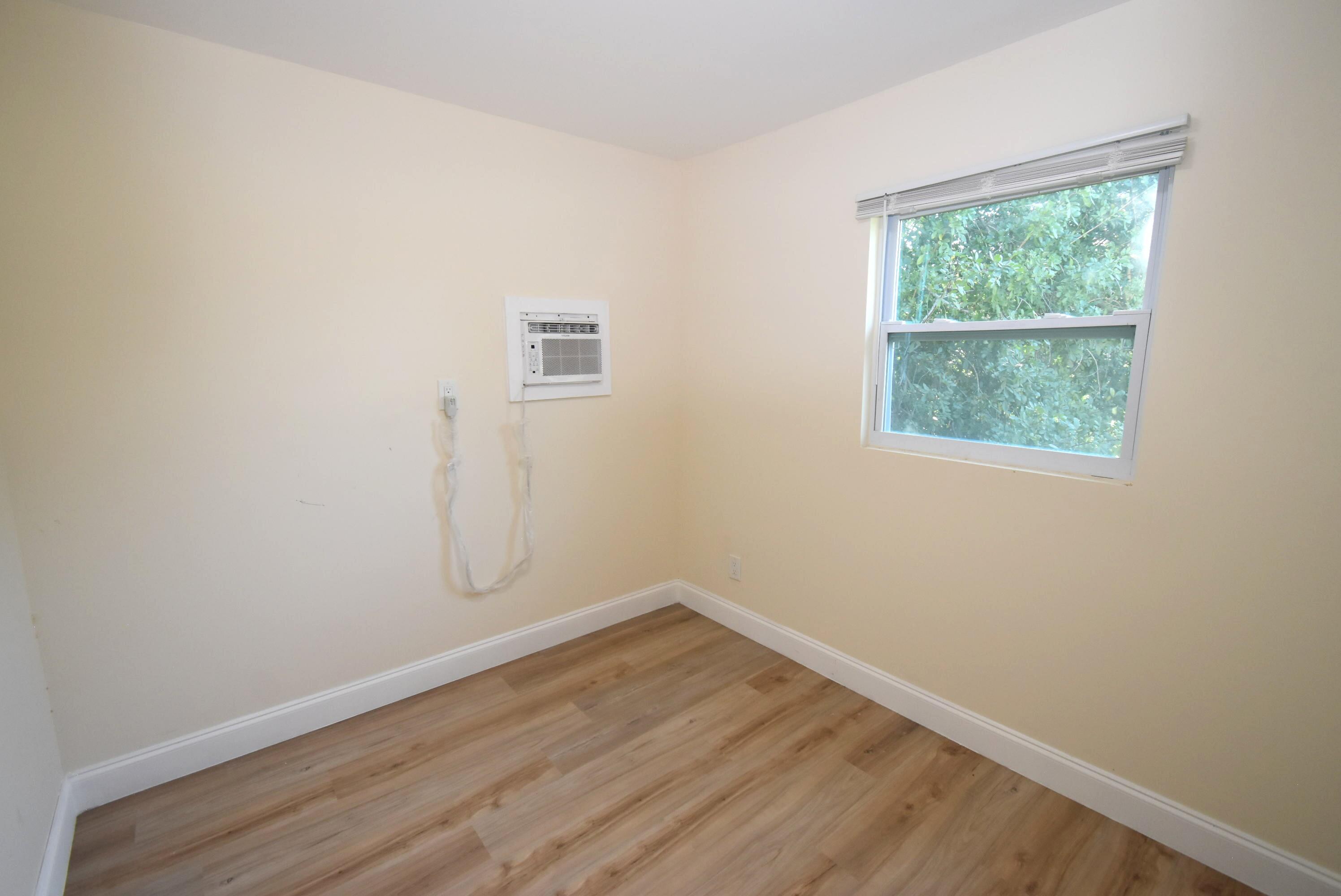 514 North 27th Street, Unit C Fort Pierce, FL 34947 - Photo 10 of 11 5 Rear Bedroom A