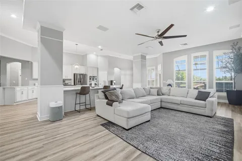 a view of field with tall trees