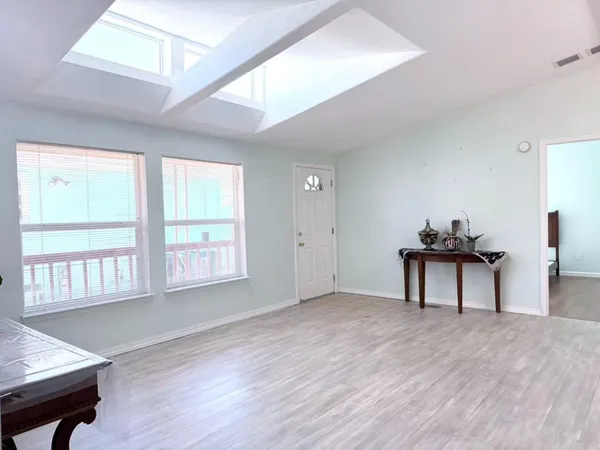 a view of a livingroom with a furniture and window