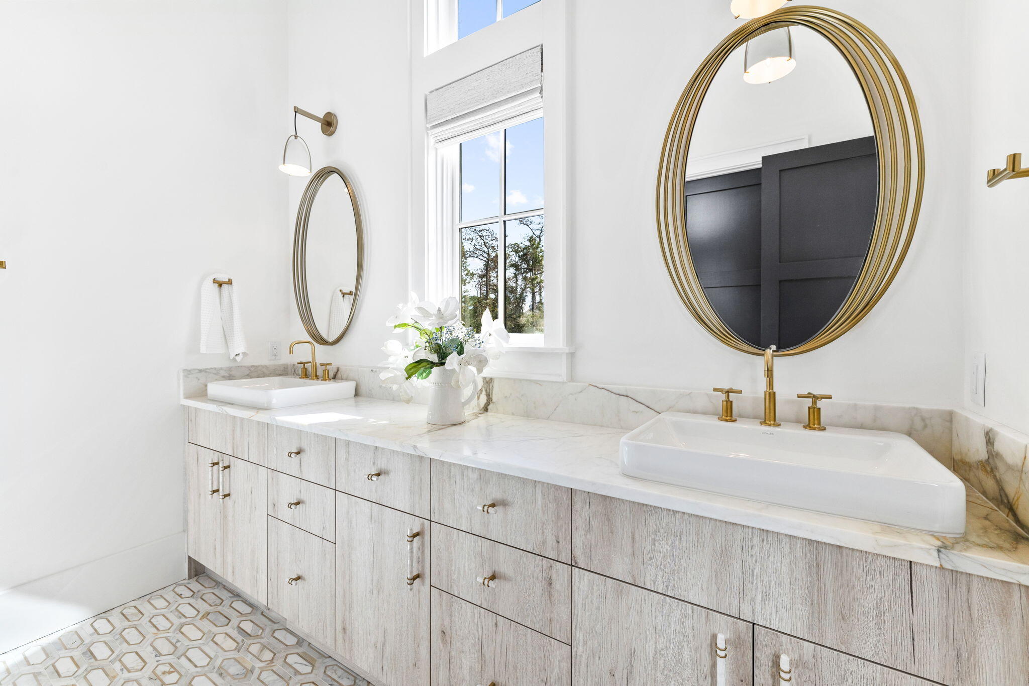 152 Climbing Rose Way Santa Rosa Beach, FL 32459 - Photo 17 of 70 a bathroom with a double vanity sink and a mirror