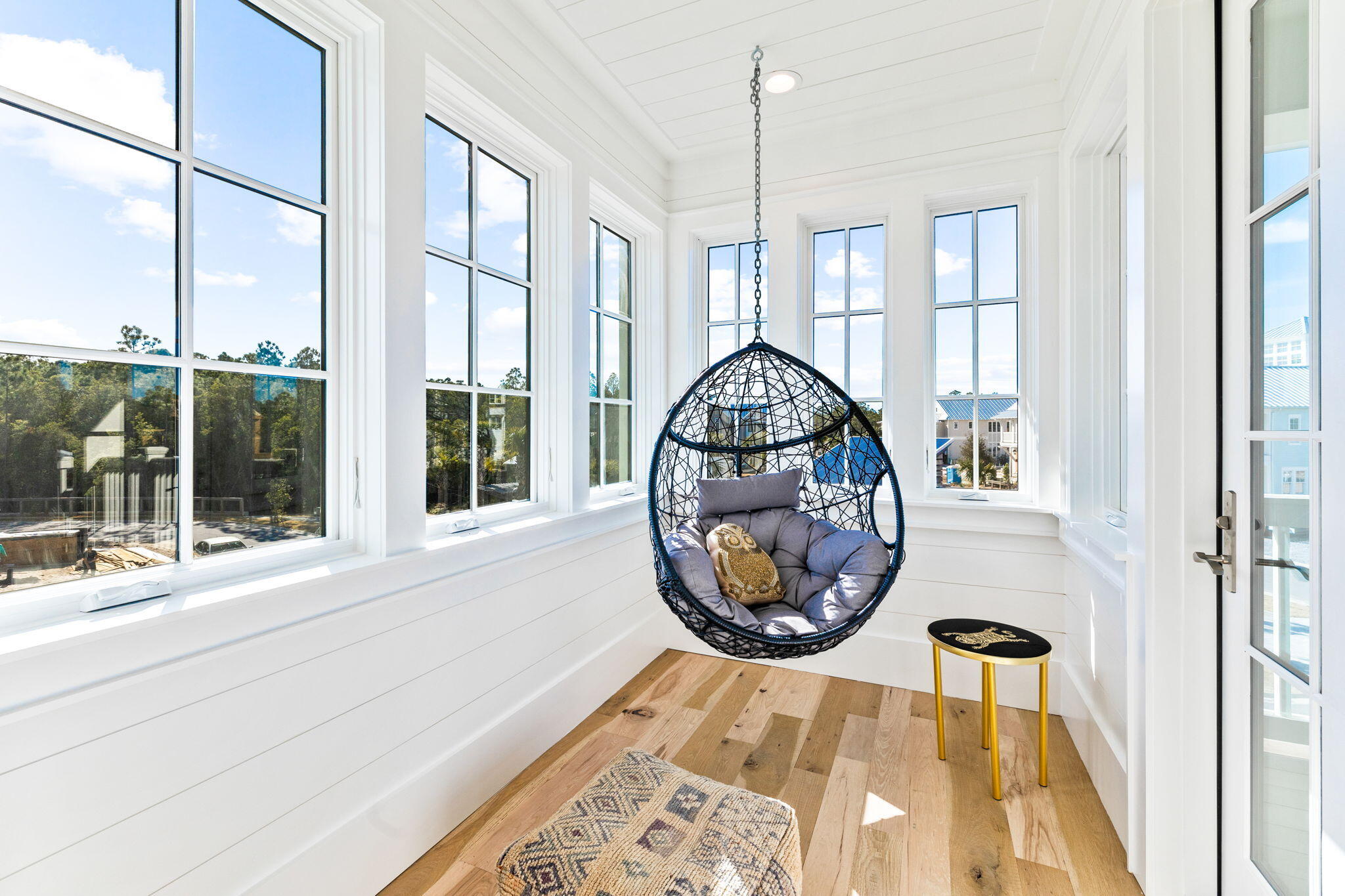 152 Climbing Rose Way Santa Rosa Beach, FL 32459 - Photo 28 of 70 a view of a livingroom with furniture wooden floor windows and a chandelier