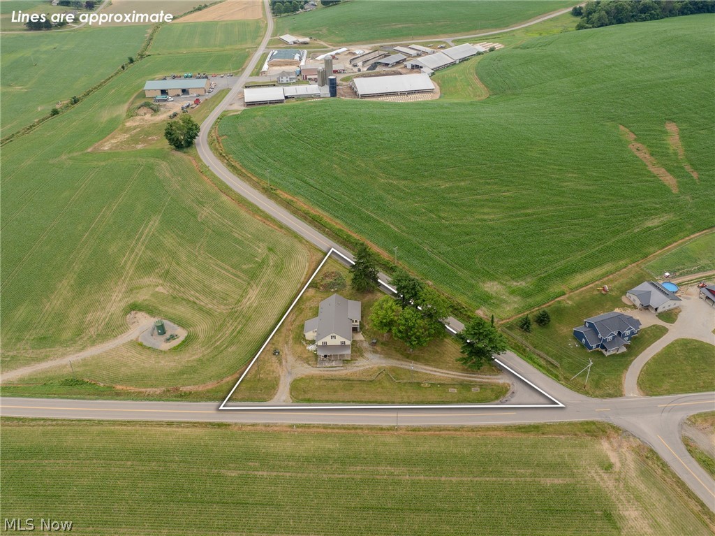 513 Ragersville Road Northwest Sugarcreek, OH 44681 - Photo 8 of 50 Drone / aerial view featuring a rural view
