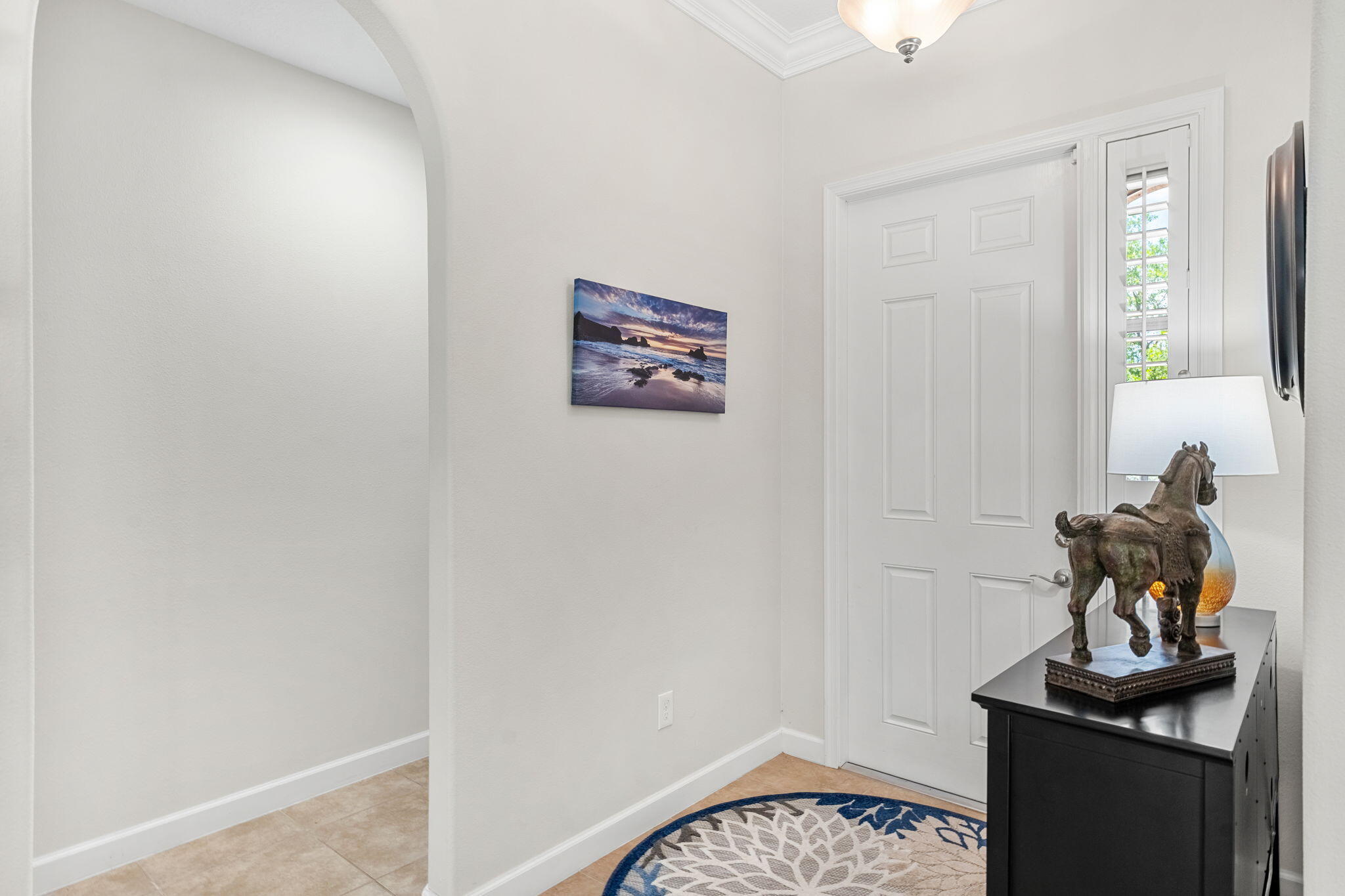 7657 Fieldstone Ranch Square Vero Beach, FL 32967 - Photo 8 of 52 a view of a hallway with entryway