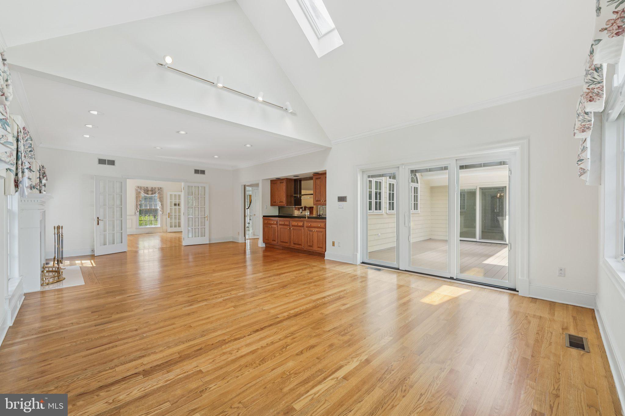 12 Paddock Drive New Hope, PA 18938 - Photo 14 of 42 a view of an empty room with window and wooden floor