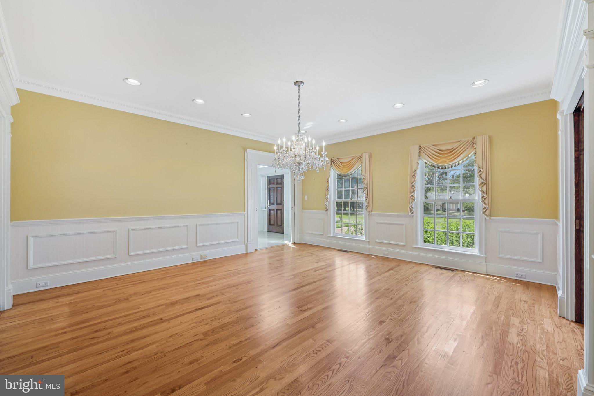 12 Paddock Drive New Hope, PA 18938 - Photo 16 of 42 a view of an empty room with wooden floor and a window