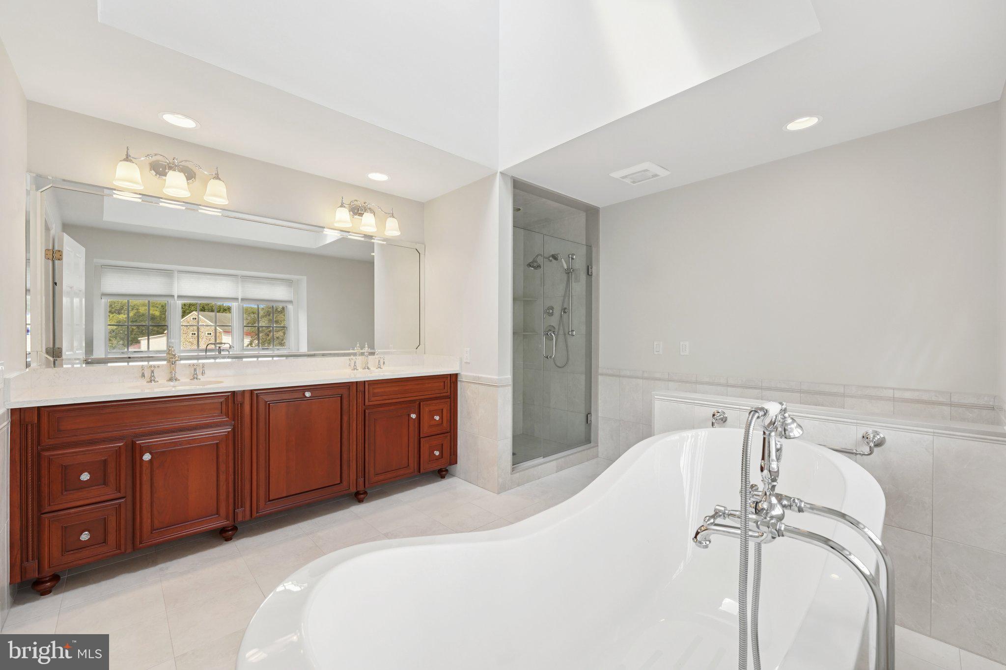 12 Paddock Drive New Hope, PA 18938 - Photo 24 of 42 a bedroom with a bed and a dresser