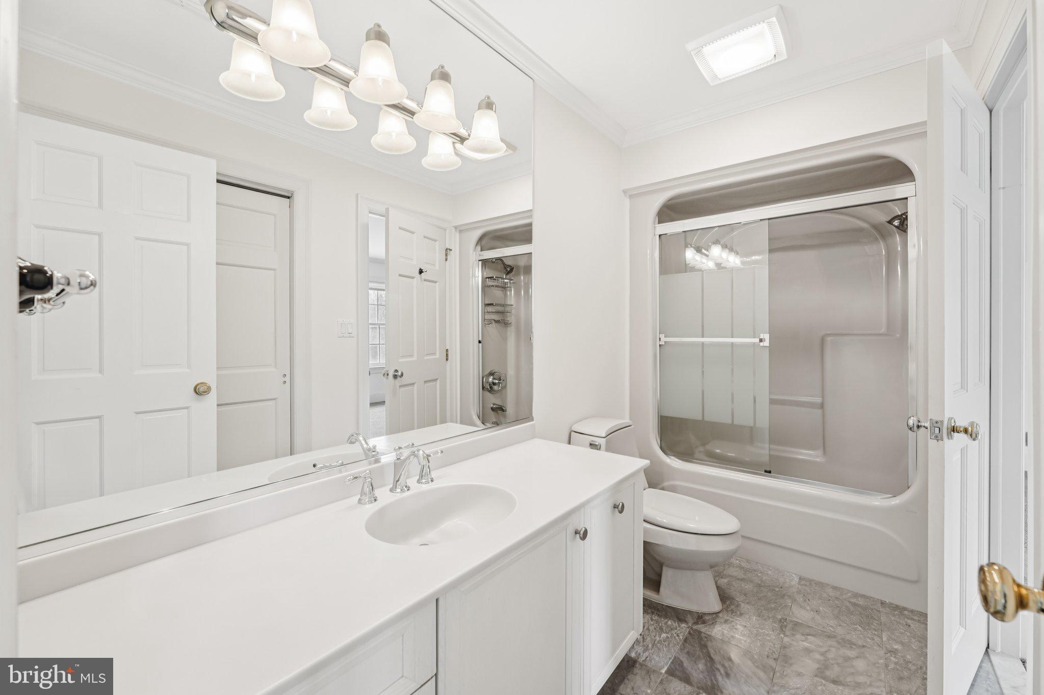 12 Paddock Drive New Hope, PA 18938 - Photo 28 of 42 a bathroom with a sink a toilet and shower