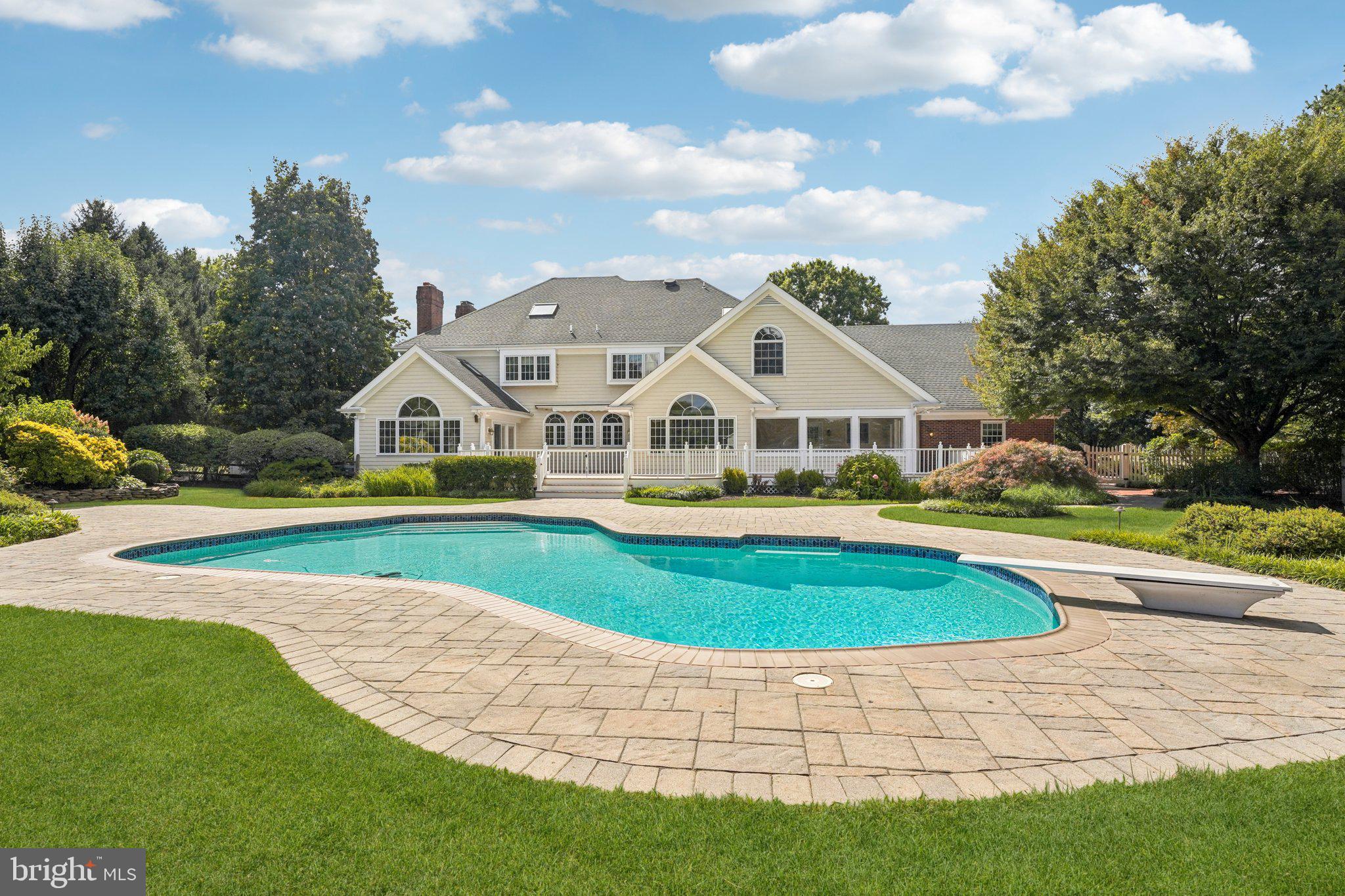 12 Paddock Drive New Hope, PA 18938 - Photo 34 of 42 a view of houses with swimming pool and green space